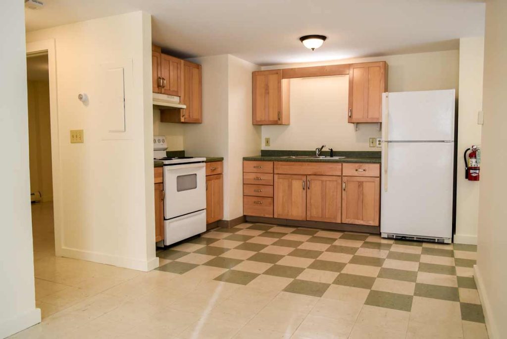 Picture of a kitchen with checkerboard flooring