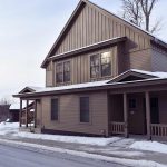 Exterior image of an apartment building in snowy conditions
