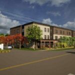 Artist rendering of 3 story apartment building currently under construction.